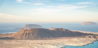 Lanzarote, Canary Islands. La Graciosa island as seen from Mirador del Rio at sunset